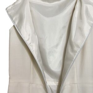 Wool blend shift dress. Fully lined in silk.